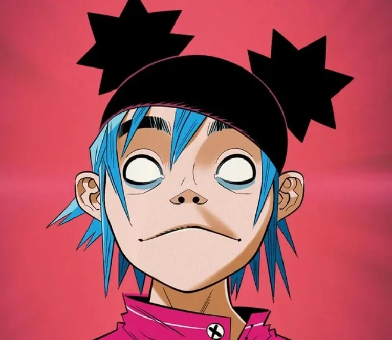 2D - Stuart Pot, chanteur principal de Gorillaz aux cheveux bleus et yeux noirs